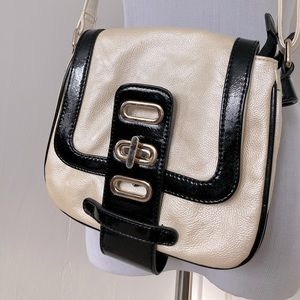 Charming Charlie white bag large buckle accent